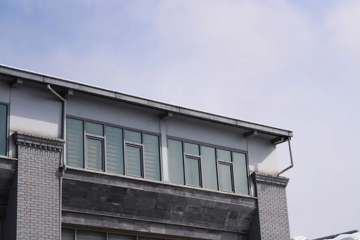 Brick commercial building with large windows, the kind of property commonly offered as loan security