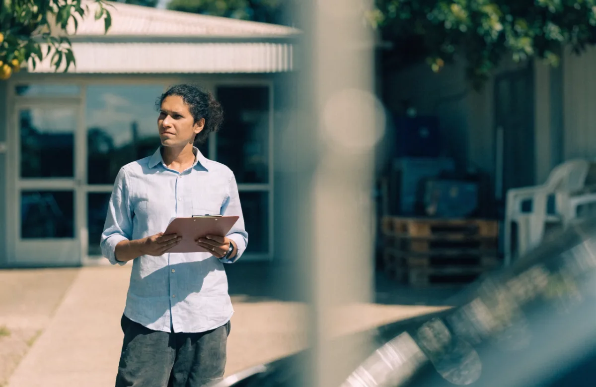 Business owner standing outside their commercial premises